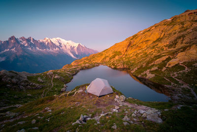 Scenic view of snowcapped mountains against sky