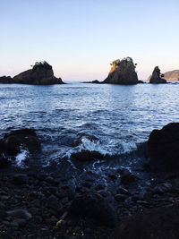 Scenic view of sea against clear sky