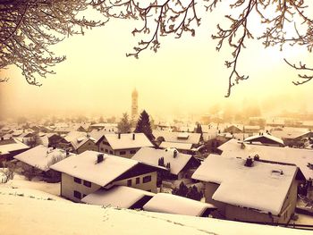 Scenic view of snow covered landscape against sky