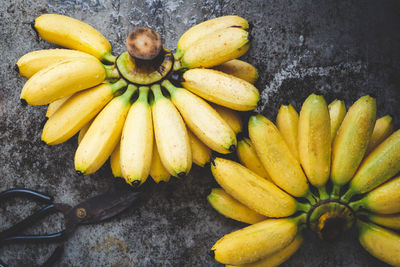 High angle view of yellow fruits on wood