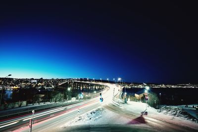 Light trails on road at night