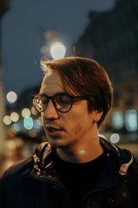 Portrait of young man looking away