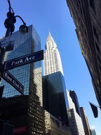 Low angle view of skyscraper against clear sky