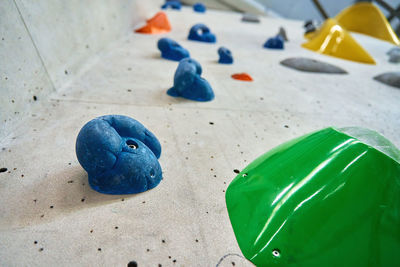 Bouldering gym with artificial colourful rock wall