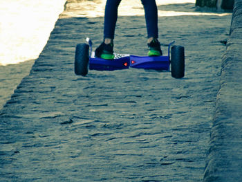 Low section of person skateboarding on skateboard