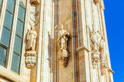 Low angle view of statue of historic building