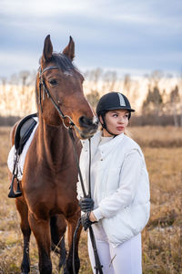 Horse standing on field