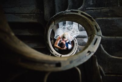 High angle view of people sitting on floor