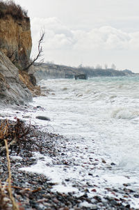 Scenic view of stormy baltic sea cliff against sky.  wustrow cliff in autumn time.