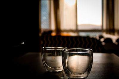 Close-up of glasses on table