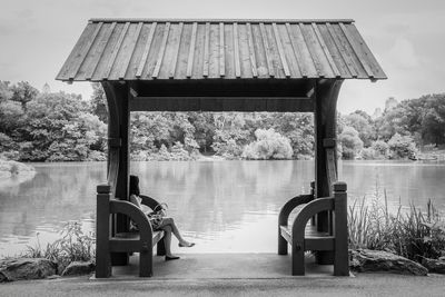 Empty bench in lake