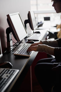 Young woman using computer