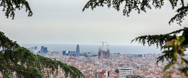 View of city buildings against sky