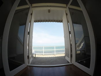 Scenic view of sea seen through window