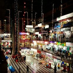 People at night in city