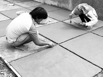 People working on tiles