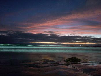 Scenic view of sea against sky at sunset