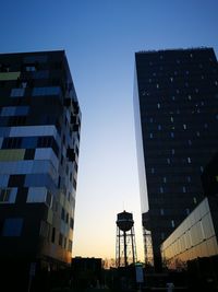 Low angle view of buildings against clear sky