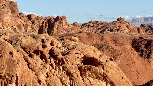 Rock formations on mountain against sky