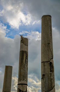 Low angle view of smoke stack against sky