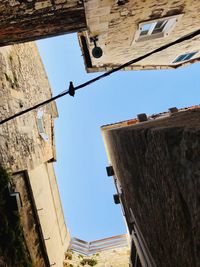 Low angle view of buildings against sky