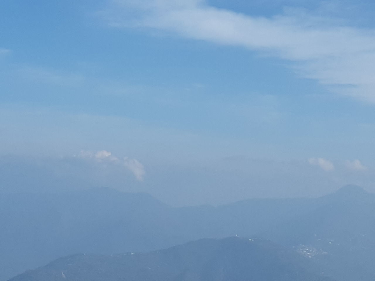 LOW ANGLE VIEW OF MOUNTAIN RANGE AGAINST SKY