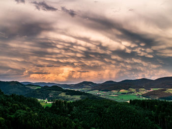 Scenic view of landscape against sky during sunset