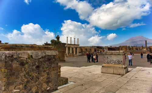 Group of people in front of historical building
