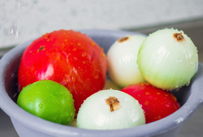 Close-up of fruits in bowl on table