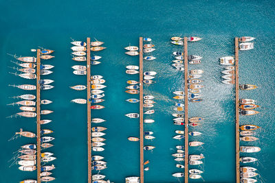 High angle view of boats moored at harbor