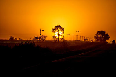 Scenic view of landscape at sunset