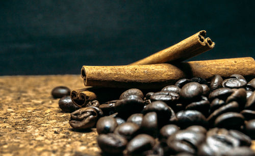 Close-up of coffee beans on table
