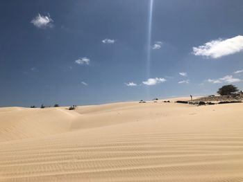 Scenic view of desert against sky