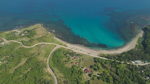 Aerial view of beautiful beach, lagoon and coral reefs. philippines, pagudpud. 