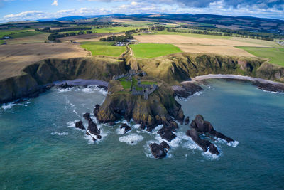 Dunnotar castle in stonhaven with aerial view from the sea