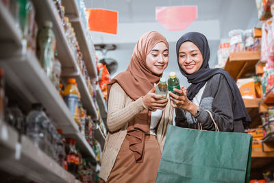 Portrait of woman using mobile phone