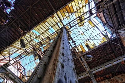 Low angle view of skylight in old factory