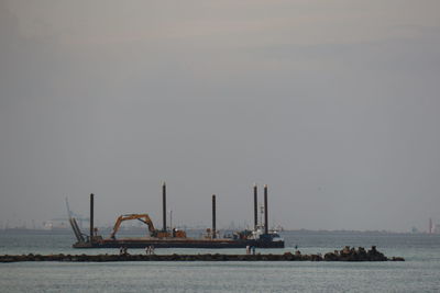 Ship in sea against sky