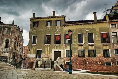 Low angle view of old building against sky