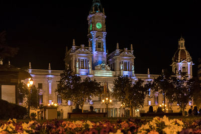 Illuminated buildings in city at night