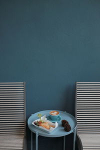 High angle view of food on table against wall