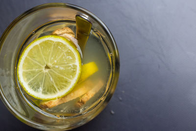 High angle view of lemon in glass on table