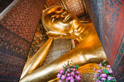 Sculpture of buddha statue outside temple