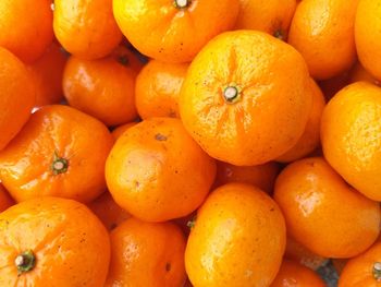 Full frame shot of oranges at market stall