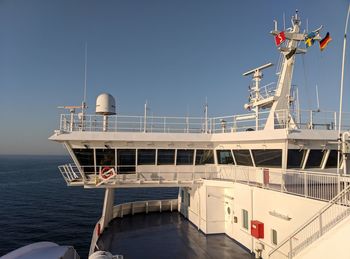 Ship in sea against clear sky