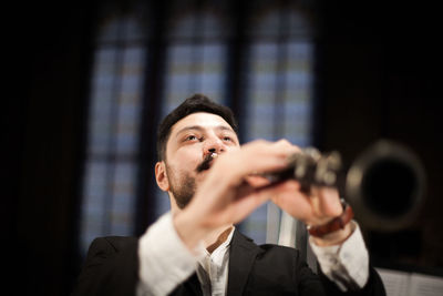 Portrait of a young man looking away