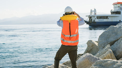 Engineer looking with high visibility jacket