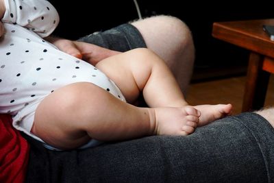 Low section of woman sitting