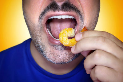 Close-up of woman holding fruit