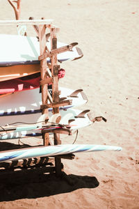 Close-up of boat moored on beach